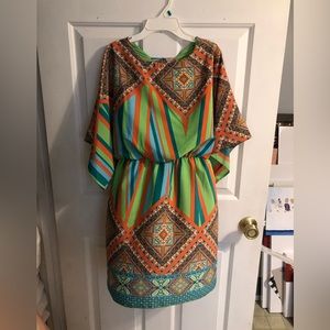 Multicolored handkerchief type top dress. Size large.